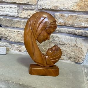 Wooden woman and child sculpture
